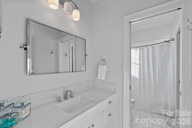 Set on a peaceful .85-acre cul-de-sac lot in the heart of The on Trump National Golf Club Charlotte in North Carolina - for sale on GolfHomes.com, golf home, golf lot