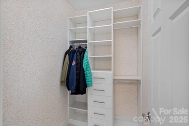 Set on a peaceful .85-acre cul-de-sac lot in the heart of The on Trump National Golf Club Charlotte in North Carolina - for sale on GolfHomes.com, golf home, golf lot