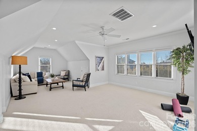 Set on a peaceful .85-acre cul-de-sac lot in the heart of The on Trump National Golf Club Charlotte in North Carolina - for sale on GolfHomes.com, golf home, golf lot