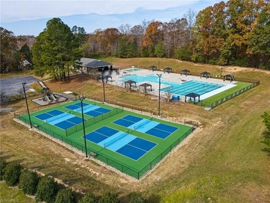 Elegant, classic, brick and stone transitional home in Salem on Salem Glen Country Club in North Carolina - for sale on GolfHomes.com, golf home, golf lot
