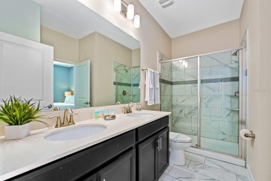 MUST SEE THIS FULLY DISNEY-THEMED POOL HOME WITH LAKE VIEW IN on The Oasis Club at Champions Gate in Florida - for sale on GolfHomes.com, golf home, golf lot
