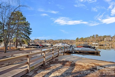 Set on a peaceful .85-acre cul-de-sac lot in the heart of The on Trump National Golf Club Charlotte in North Carolina - for sale on GolfHomes.com, golf home, golf lot