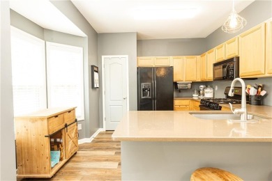 Welcome to this beautifully maintained three-level end-unit on Sugar Hill Golf Club in Georgia - for sale on GolfHomes.com, golf home, golf lot