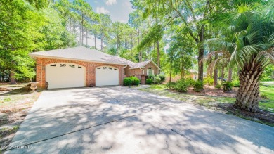 Welcome to this charming all-brick custom built home in Carolina on Carolina Shores Golf Course in North Carolina - for sale on GolfHomes.com, golf home, golf lot