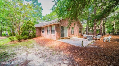 Welcome to this charming all-brick custom built home in Carolina on Carolina Shores Golf Course in North Carolina - for sale on GolfHomes.com, golf home, golf lot