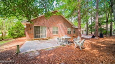 Welcome to this charming all-brick custom built home in Carolina on Carolina Shores Golf Course in North Carolina - for sale on GolfHomes.com, golf home, golf lot