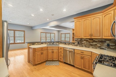 Beautiful custom built parade home that sits very close to world on Grand Haven Golf Club in Michigan - for sale on GolfHomes.com, golf home, golf lot