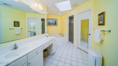 Welcome to this charming all-brick custom built home in Carolina on Carolina Shores Golf Course in North Carolina - for sale on GolfHomes.com, golf home, golf lot