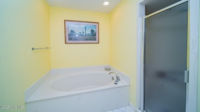 Welcome to this charming all-brick custom built home in Carolina on Carolina Shores Golf Course in North Carolina - for sale on GolfHomes.com, golf home, golf lot