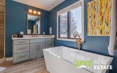 Beautifully remodeled and perfectly located in the coveted Olive on Olive Glenn Golf and Country Club in Wyoming - for sale on GolfHomes.com, golf home, golf lot