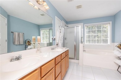 Welcome to this beautifully maintained three-level end-unit on Sugar Hill Golf Club in Georgia - for sale on GolfHomes.com, golf home, golf lot
