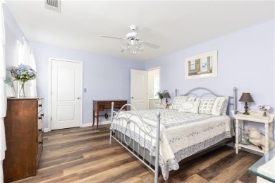 Welcome to this beautifully maintained three-level end-unit on Sugar Hill Golf Club in Georgia - for sale on GolfHomes.com, golf home, golf lot