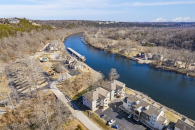 Outstanding WATER VIEW condo with DIAMOND RESORT AMENITIES is on Pointe Royale Village Country Club in Missouri - for sale on GolfHomes.com, golf home, golf lot