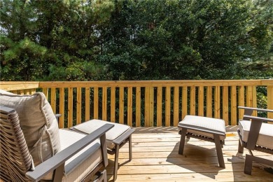 Welcome to this beautifully maintained three-level end-unit on Sugar Hill Golf Club in Georgia - for sale on GolfHomes.com, golf home, golf lot