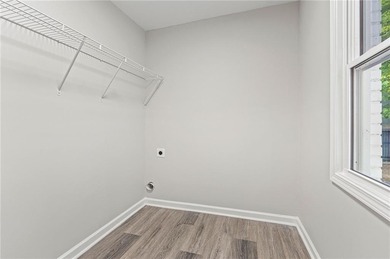 It's hard to miss this fully renovated, 4 side brick beauty on Alfred Tup Holmes Golf Course in Georgia - for sale on GolfHomes.com, golf home, golf lot