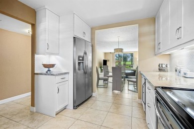 Beautifully updated 2BD/2BA condo at The Palms of Deer Creek in on Deer Creek Golf Club in Florida - for sale on GolfHomes.com, golf home, golf lot