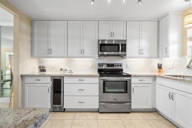 Beautifully updated 2BD/2BA condo at The Palms of Deer Creek in on Deer Creek Golf Club in Florida - for sale on GolfHomes.com, golf home, golf lot