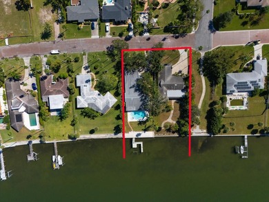 Seize the chance to own a prime 74-foot waterfront lot on The Dunedin Country Club in Florida - for sale on GolfHomes.com, golf home, golf lot