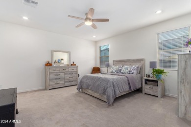 This exceptional Verrado home showcases meticulous pride of on Verrado Golf Club - Victory in Arizona - for sale on GolfHomes.com, golf home, golf lot