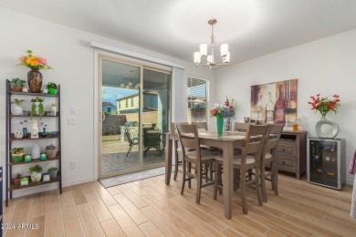 This exceptional Verrado home showcases meticulous pride of on Verrado Golf Club - Victory in Arizona - for sale on GolfHomes.com, golf home, golf lot