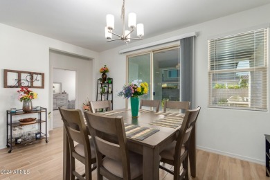 This exceptional Verrado home showcases meticulous pride of on Verrado Golf Club - Victory in Arizona - for sale on GolfHomes.com, golf home, golf lot