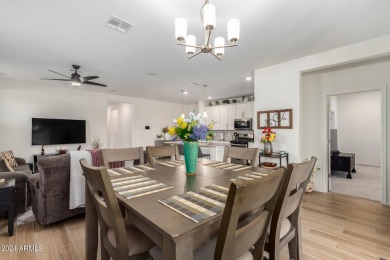 This exceptional Verrado home showcases meticulous pride of on Verrado Golf Club - Victory in Arizona - for sale on GolfHomes.com, golf home, golf lot