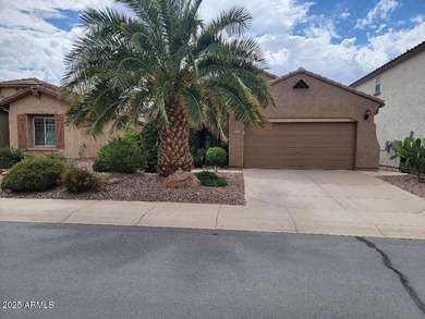 WELCOME HOME! This STUNNING, bright and open concept floor plan on Poston Butte Golf Club in Arizona - for sale on GolfHomes.com, golf home, golf lot