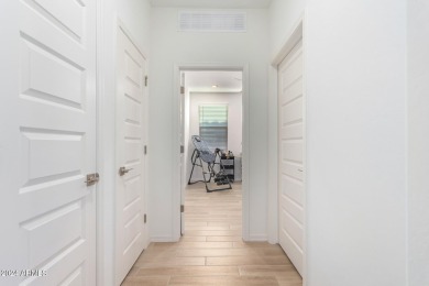 This exceptional Verrado home showcases meticulous pride of on Verrado Golf Club - Victory in Arizona - for sale on GolfHomes.com, golf home, golf lot