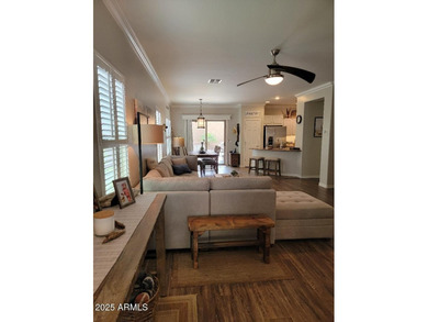 WELCOME HOME! This STUNNING, bright and open concept floor plan on Poston Butte Golf Club in Arizona - for sale on GolfHomes.com, golf home, golf lot