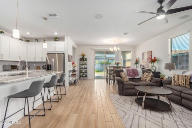 This exceptional Verrado home showcases meticulous pride of on Verrado Golf Club - Victory in Arizona - for sale on GolfHomes.com, golf home, golf lot