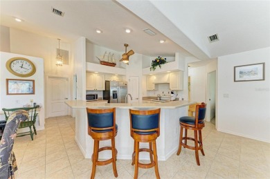 Waterfront Living in Rotonda West Nestled in the serene and on Pinemoor West Golf Club in Florida - for sale on GolfHomes.com, golf home, golf lot