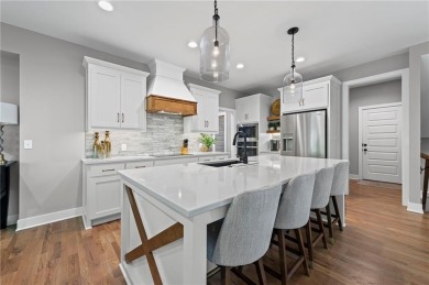 This stunning move-in ready 1.5-story home is nestled near the on Heritage Park Golf Course in Kansas - for sale on GolfHomes.com, golf home, golf lot