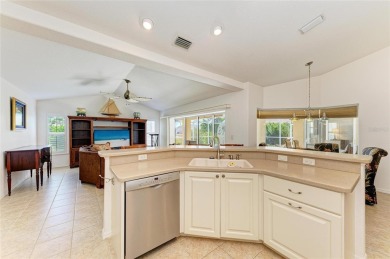 Waterfront Living in Rotonda West Nestled in the serene and on Pinemoor West Golf Club in Florida - for sale on GolfHomes.com, golf home, golf lot