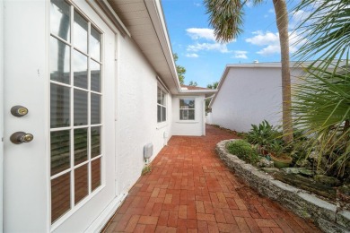Custom Jefferson Model Single-Family Private Courtyard Home with on On Top of the World Golf Course in Florida - for sale on GolfHomes.com, golf home, golf lot
