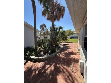 Custom Jefferson Model Single-Family Private Courtyard Home with on On Top of the World Golf Course in Florida - for sale on GolfHomes.com, golf home, golf lot