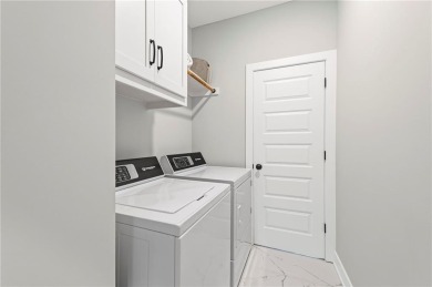This stunning move-in ready 1.5-story home is nestled near the on Heritage Park Golf Course in Kansas - for sale on GolfHomes.com, golf home, golf lot