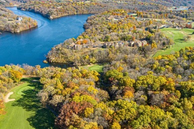 This Branigar farmhouse-style home is set on a beautiful, wooded on Eagle Ridge Inn and Resort in Illinois - for sale on GolfHomes.com, golf home, golf lot