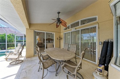 Waterfront Living in Rotonda West Nestled in the serene and on Pinemoor West Golf Club in Florida - for sale on GolfHomes.com, golf home, golf lot