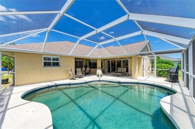 Waterfront Living in Rotonda West Nestled in the serene and on Pinemoor West Golf Club in Florida - for sale on GolfHomes.com, golf home, golf lot