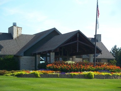 This Branigar farmhouse-style home is set on a beautiful, wooded on Eagle Ridge Inn and Resort in Illinois - for sale on GolfHomes.com, golf home, golf lot