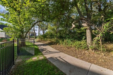 This stunning move-in ready 1.5-story home is nestled near the on Heritage Park Golf Course in Kansas - for sale on GolfHomes.com, golf home, golf lot