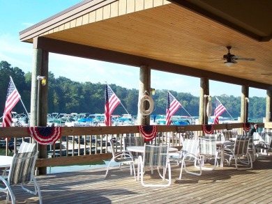 This Branigar farmhouse-style home is set on a beautiful, wooded on Eagle Ridge Inn and Resort in Illinois - for sale on GolfHomes.com, golf home, golf lot