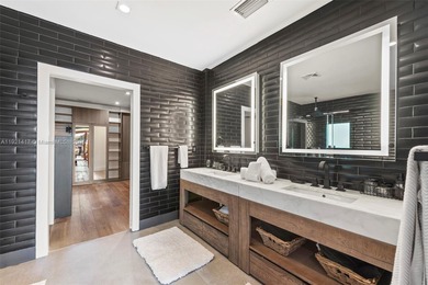 Live in the coveted, gated community of Normandy Shores, known on Normandy Shores Golf Course in Florida - for sale on GolfHomes.com, golf home, golf lot