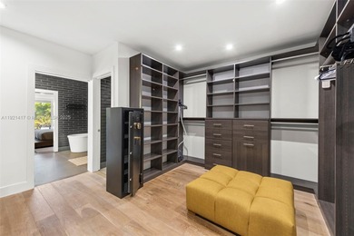 Live in the coveted, gated community of Normandy Shores, known on Normandy Shores Golf Course in Florida - for sale on GolfHomes.com, golf home, golf lot