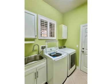 MAKE THIS HOUSE YOUR HOME! THERE IS SO MUCH TO APPRECIATE IN on Caloosa Greens Executive Golf Course in Florida - for sale on GolfHomes.com, golf home, golf lot