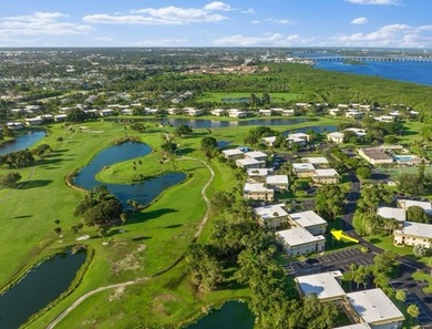 Bright, spacious first floor condo in Vista Gardens, a beautiful on Vero Beach South Golf Course in Florida - for sale on GolfHomes.com, golf home, golf lot
