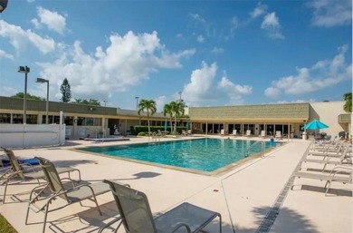 Bright, spacious first floor condo in Vista Gardens, a beautiful on Vero Beach South Golf Course in Florida - for sale on GolfHomes.com, golf home, golf lot