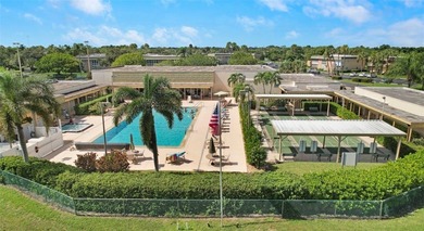 Bright, spacious first floor condo in Vista Gardens, a beautiful on Vero Beach South Golf Course in Florida - for sale on GolfHomes.com, golf home, golf lot