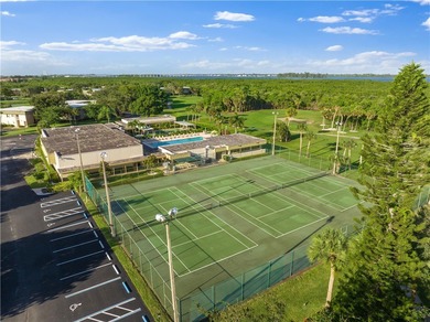 Bright, spacious first floor condo in Vista Gardens, a beautiful on Vero Beach South Golf Course in Florida - for sale on GolfHomes.com, golf home, golf lot