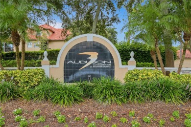 Experience serene pond views from this first-floor, corner unit on Feather Sound Country Club in Florida - for sale on GolfHomes.com, golf home, golf lot